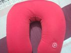 Neck pillow with massager