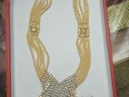 necklace with pearl tarsel