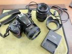 Nikon d 3200 with 50 mm prime lens and 18-55 kit