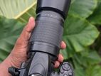 Nikon D3400 with zoom lens 70/300 mm
