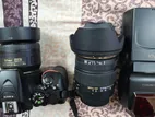 Nikon D5500 camera with lens and flash