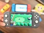 Nintendo switch lite new condition (with bag and Fifa 18 free)