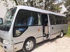 Nissan Ac Coster Bus For Rent