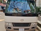 Nissan Ac Coster Bus For Rent