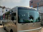 Nissan Coster Ac Bus For Rent