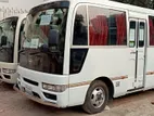 Nissan Coster Bus For Rent