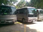 Nissan Coster Bus For Rent