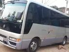 Nissan coster Bus For Rent