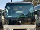Nissan Coster Bus For Rent