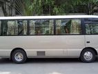 Nissan Coster Bus For Rent