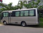 Nissan Coster Bus For Rent