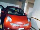 Nissan March red 2003