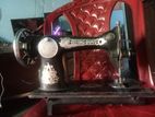 Old flying dove sewing machine