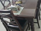 One table and 6 chairs.