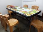 Plastic dining table with 6 chairs