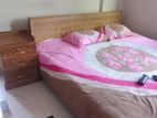 queen size bed and side table by (5×7)