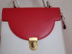 red-white handbag bought from Thailand