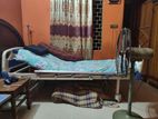 Rising hospital bed