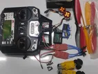 Flysky FS-i6X 6-channel RC transmitter and accompanying drone/RC