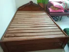 সেগুন কাঠের সুন্দর মজবুত একটি বেড।