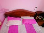 Shegun wooden double bed with bedside table