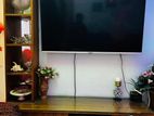 Singer 52 inch LED Smart TV with decor