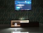 Smart tv stand with strip light