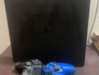 SONY PS4 SLIM WITH 2 CONTROLLERS AND HDMI CABLE PLEASE LOT OF GAME