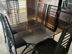 Strong Glass Dining Table with 6 Steel Chairs