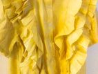 Stylish yellow ruffled top,