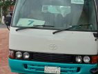 Toyota Coaster . 2003