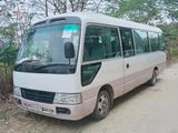 Toyota Coaster . 2004