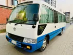 Toyota Coaster . 2006