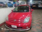 Toyota ist red yain colour 2004
