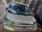 Toyota Noah gold clour 2005