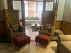Two luxurious wing sofa with foot rest in excellent condition
