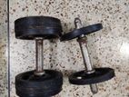 two used dumbbells 7.5kg and 2.5kg