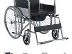 Wheel chair with commode