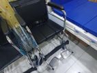 wheelchair with commode provision