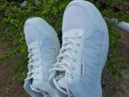 white sports shoes