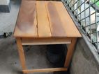 wood made table and chair