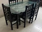 Wooden & Glass dining table with 6 chairs.
