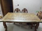 Wooden dining table with 6 chairs