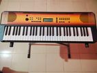 Yamaha PSR-E360 keyboard with adapter and stand